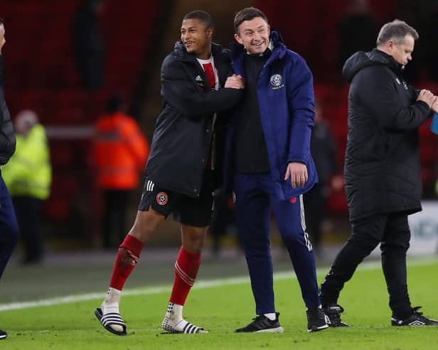 Rhian Brewster with Sheffield United manager Paul Heckingbottom: Simon Bellis / Sportimage