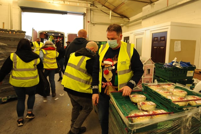 Volunteers load up delivery vans at the start of delivery day for the Cottage Centre's 2020 Christmas appeal (Pic: Fife Photo Agency)