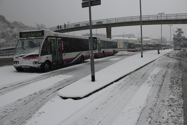 Out of service First buses get a wintry coat as they sit still in Hilsea, near the Portsbridge Roundabout.