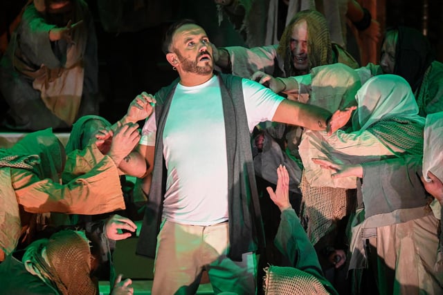 Jesus (Darren Lewis) is engulfed by lepers in one of the most powerful scenes in Jesus Christ Superstar.