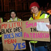 (l-r) Ellen McGovern, Sabine Sharp and Charlotte Sisman with their banners for the Reclaim the Night march by Sheffield University Student Union. Picture: Andrew Roe