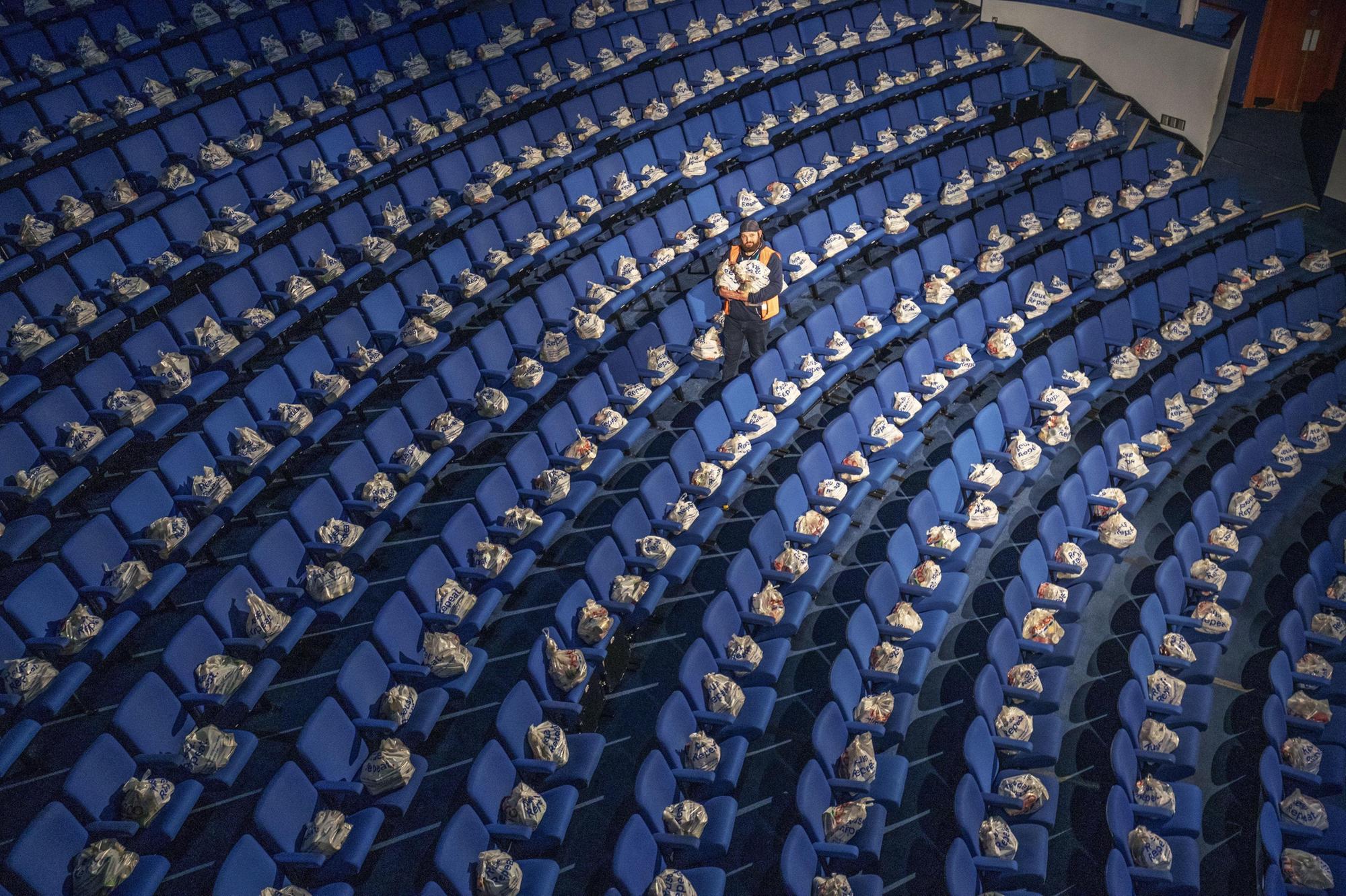 Picture shows a council worker walking through the seats at the Empire Theatre at Eden Court in Inverness