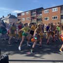 Members of the crowd with dancers during the Everybody's Talking About Jamie street party on Deerlands Avenue