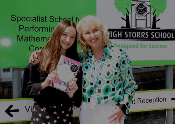  Former High Storrs pupil Sharron Lowe presents current student Emma Ransom with her best-selling self-help book The Mind Makeover, The Answers to The Best YOU Yet! 
