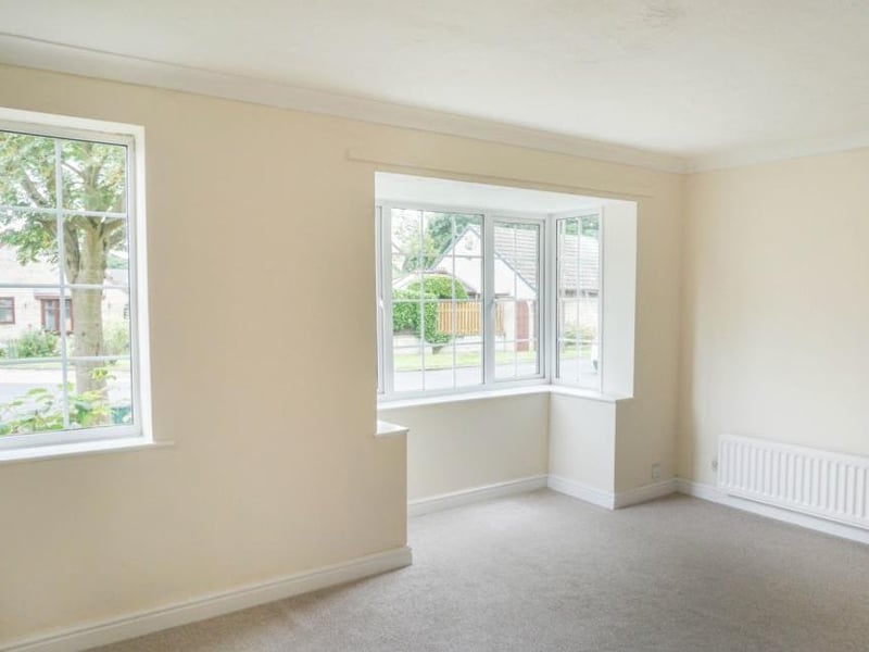 Front facing lounge with large bay window and side window bringing in lots of natural light, wall lights, tv point, coving and central heating radiator.  Perfect space to sit and relax with family and friends and leading into the dining area