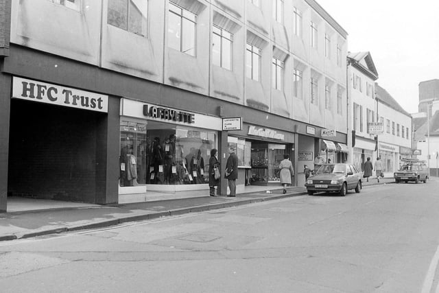 A number of different shops on Queen Street in the eighties - can you remember it like this?