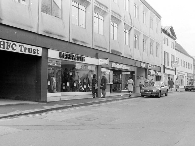 A number of different shops on Queen Street in the eighties - can you remember it like this?