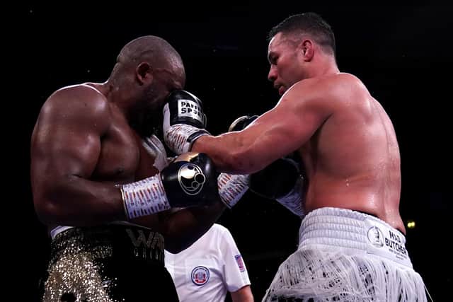 Joseph Parker (right) strikes Derek Chisora during the pair's WBO Intercontinental Heavyweight Title fight at the AO Arena, Manchester. Photo: PA.
