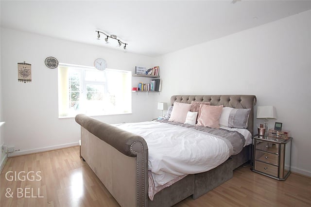 There are a total of 4 double bedrooms, with the spacious master bedroom featuring a range of fitted wardrobes, laminate wood flooring, as well as a dressing room and an ensuite.