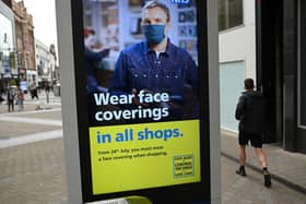 The wearing of facemasks in shops in England will be compulsory from Friday.