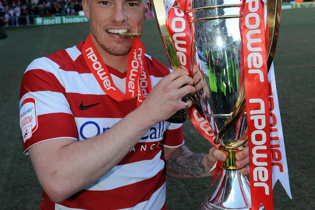 Iain Hume with the League One trophy