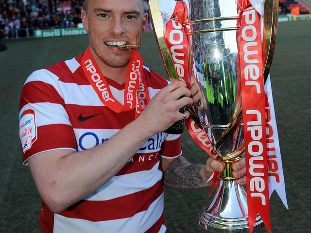 Iain Hume with the League One trophy