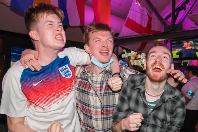 England fans celebrate at The Common Room in Sheffield