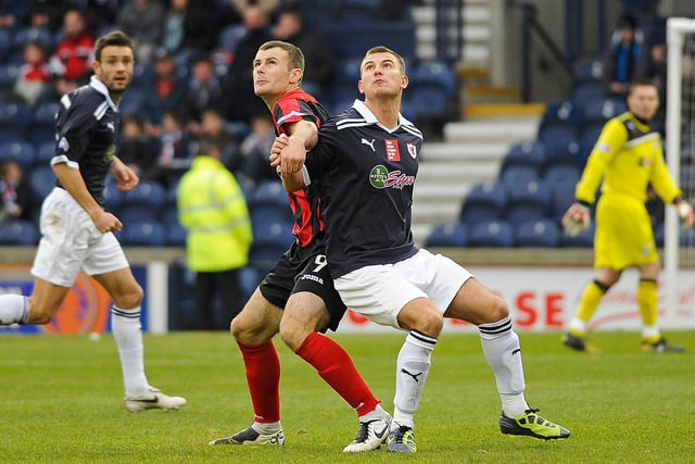 Queens' Willie Dyer Kevin Smith go back-to-back in this October 2011 home defeat for Rovers.