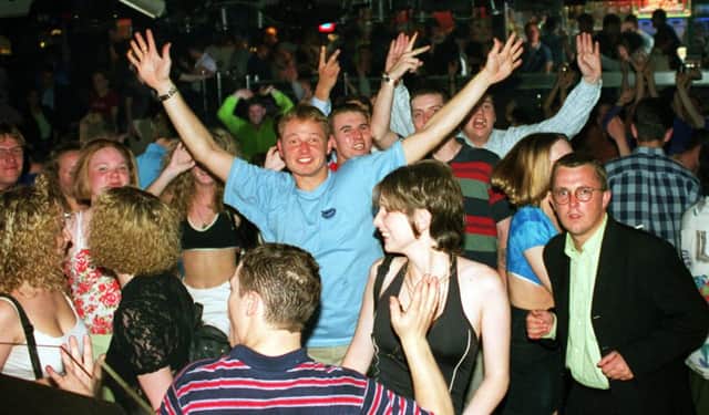 Revellers dancing in 1997
