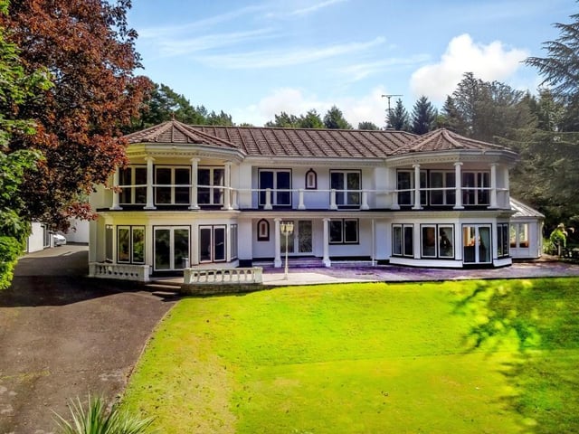 Four double bedrooms, all en suite, have access to first-floor balconies, including a semi-circular one at the front. The superb master bedroom is fitted with built-in wardrobes and a five-piece bathroom suite featuring a built-in jacuzzi bath, low-level WC, bidet and his and hers wash hand basins.