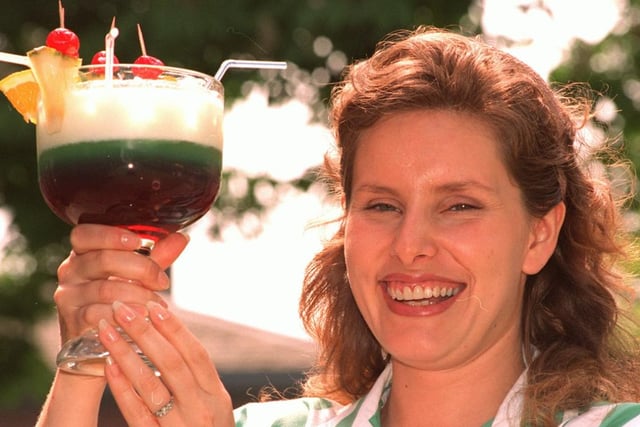 Kerry Hall with a fruity cocktail at Hanrahan's in 1996