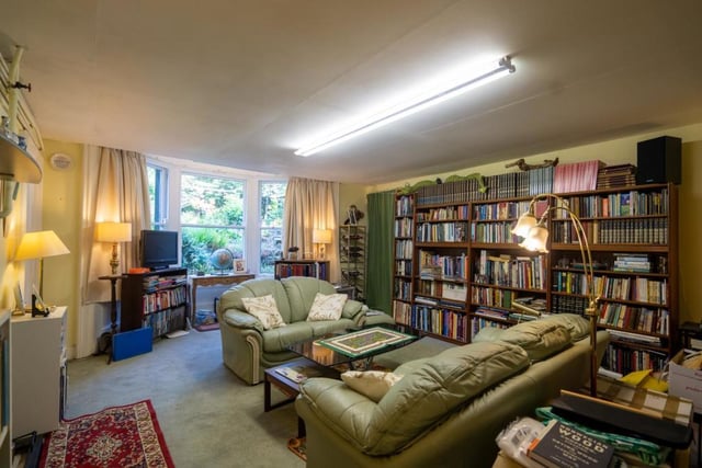 A large library/ or reception room is also located inside the property.