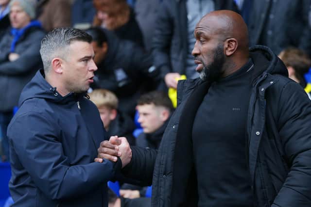 Sheffield Wednesday manager Darren Moore with Steven Schumacher of Plymouth Argyle. (Ian Hodgson/PA Wire)