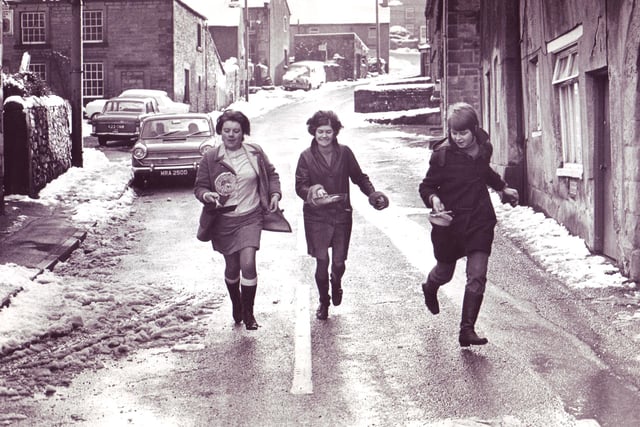 Winners of the Winster Pancake Race for Ladies - left to right Pauline Fox (1st), Carolyn Boam (3rd) and Ann Marsden (2nd) on February 10, 1970