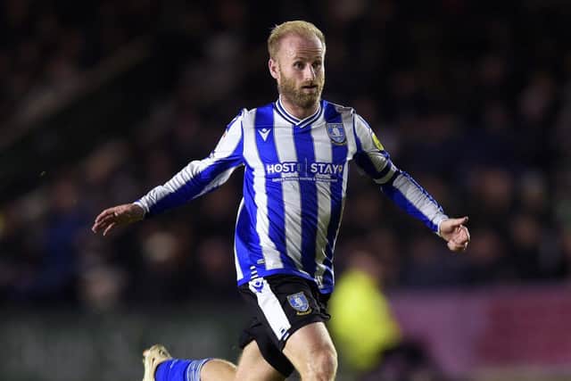 Barry Bannan says his wages halved when Sheffield Wednesday were relegated.