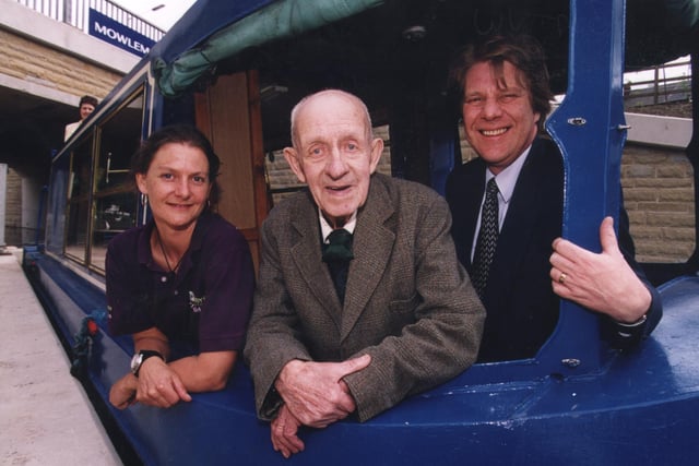 Ernest Botham, 90, enjoyed the first canal boat trip with Anna Kielty,  Chesterfield Canal Greenway Project Officer and Matt Taylor, the country council's principal engineer in 2001