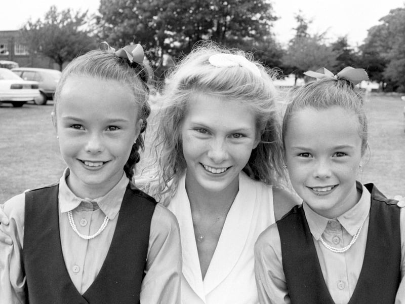 Do you recognise this smiling trio?