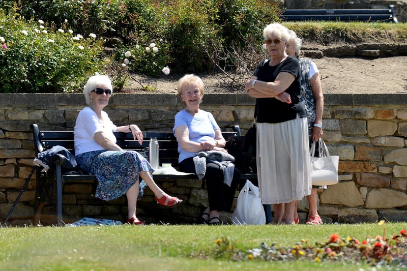 These ladies were enjoying a chat in the bright warm sunshine as they relaxed in the Croft Gardens in 2018.