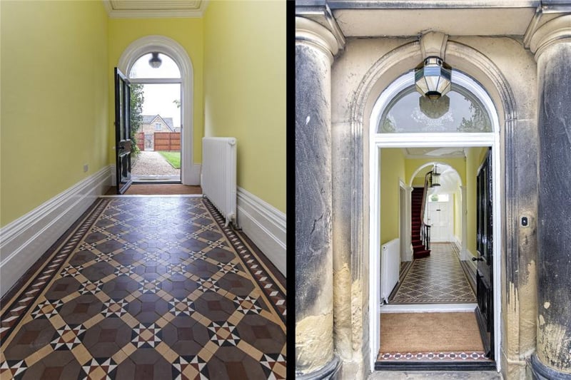 Original solid entrance door leading into a spacious entrance vestibule. Original ornate tiled flooring.