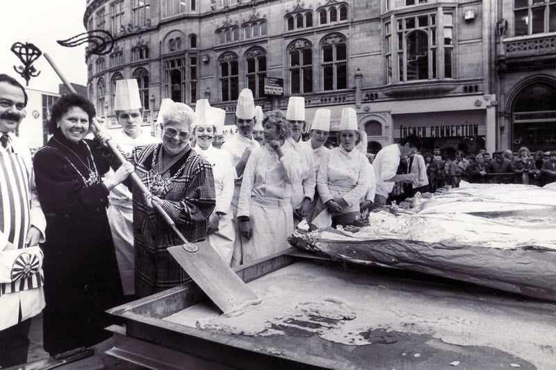 The Lord Mayor of Sheffield cuts a slice of the world's biggest Yorkshire Pudding made in aid of Children in Need in November 1988