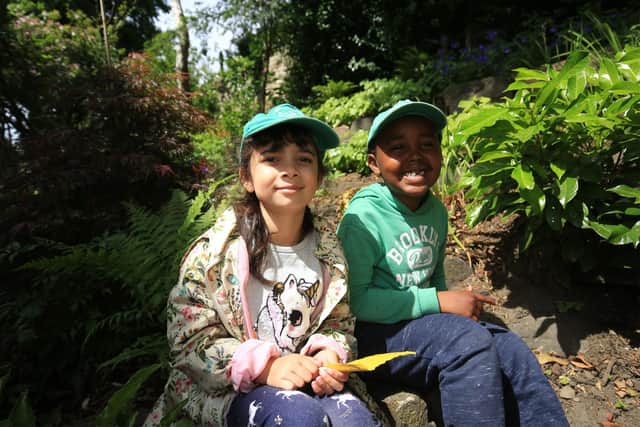 Percy Cane Rock Garden and Pocket Park at Broomhill Community Library: Pictured in the new garden are Willow Gandhi, six, and Ubeid Saeed, six. Picture: Chris Etchells