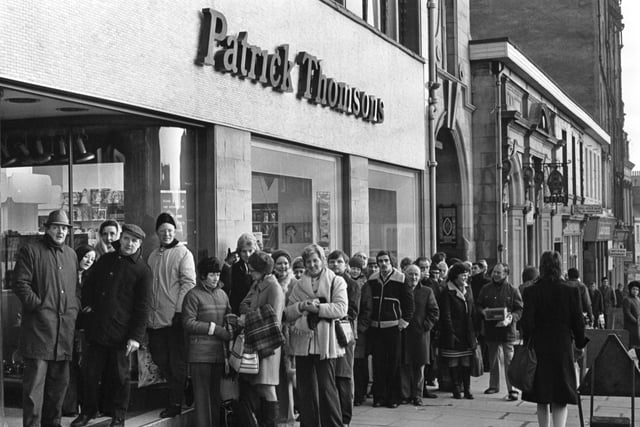 Fans of American singer Perry Como queue outside Patrick Thomsons department store in the High Street for tickets to his Edinburgh concert in January 1975.
Patrick Thomson's closed down in 1976