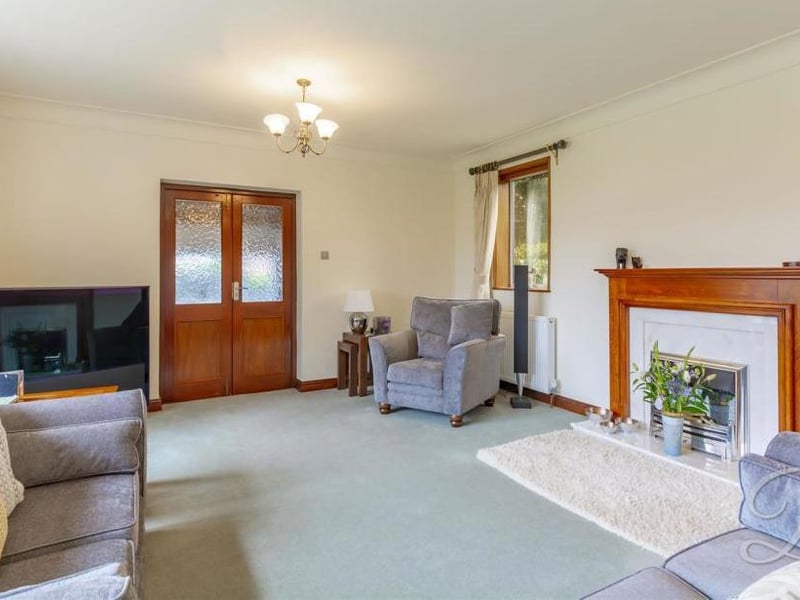 Imagine settling down here for a cosy night in front of the fire. A lovely living room.