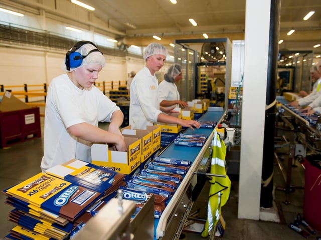 Oreo cookies are boxed up in 2014. Today the factory is the biggest confectionery site owned by Mondelez in Europe producing approximately 40,000 tonnes of sweets and crisps each year.