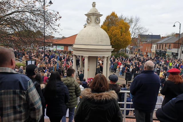 Crowds turned out to pay their respects to fallen soldiers at the town's war memorial on Sunday.