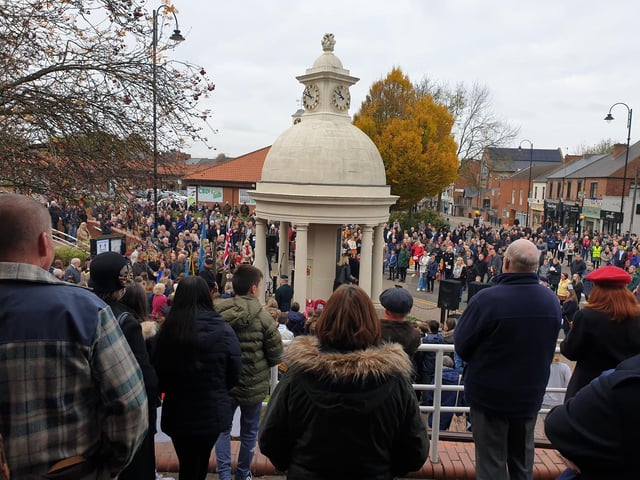 Crowds turned out to pay their respects to fallen soldiers at the town's war memorial on Sunday.