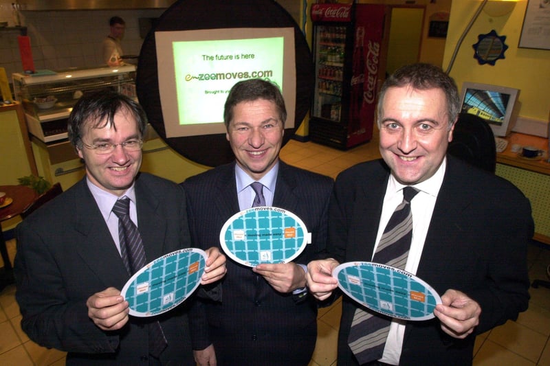 Sheffield legal firm AMS Law launched their on-line conveyancing service " e-zeemoves.com" at Havana internet Cafe, Devonshire Green, Sheffield. Proudly displaying their " House" mats are, left to right, John Warner , partner with Barber Harrison and Platt accountants, Robert Bryars, partner AMS law and partner at Blundells estate agents Andy Winter pictured in 2002.