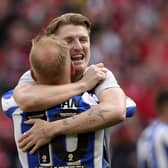 Barry Bannan embraces George Byers at the final whistle after Sheffield Wednesday's promotion. (Steve Ellis)
