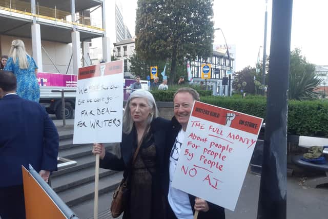 Alice Nutter and Simon Beaufoy, writers of The Full Monty Disney+ TV sequel, stage a picket outside the screening at the Showroom Cinema on Monday, June 5. They were not able to speak to the press at the time but have now spoken to The Star