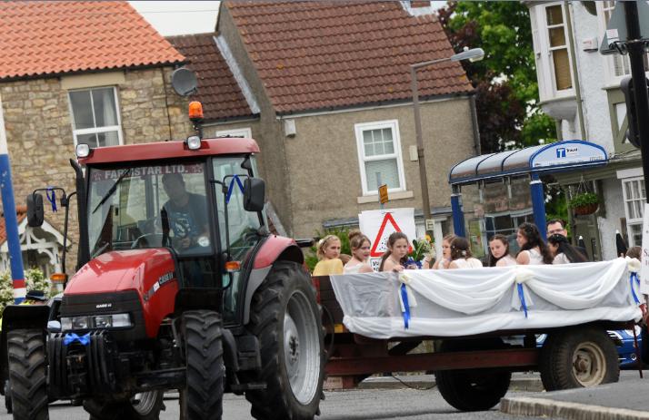 The May Queen and her attendents during a parade in Wadsworth.