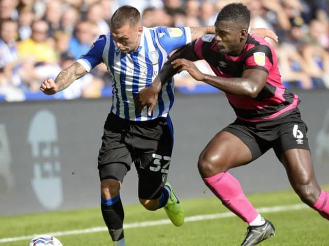 Sheffield Wednesday defender Jack Hunt has jumped to the defence of his manager Darren Moore.