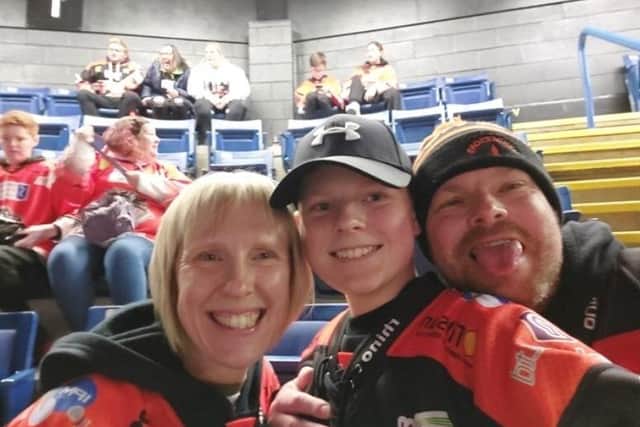 Claire Bateman, Richard and their son at a Sheffield Steelers game.