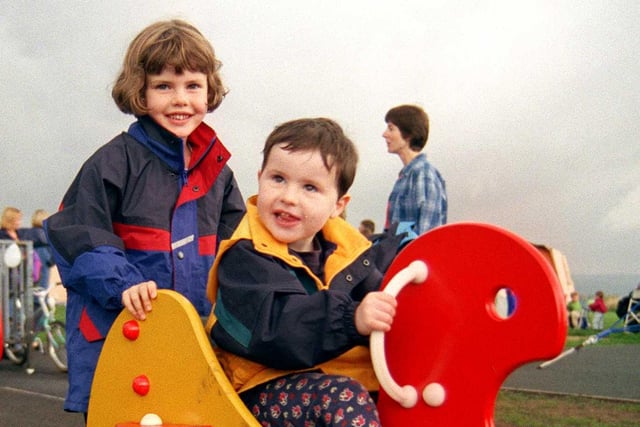 Jess Dooley gets a push from her sister Molly at Bole Hill playground in 1999