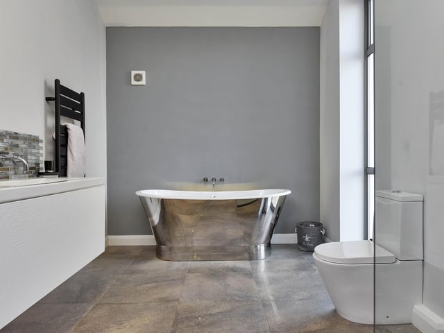 The master bedroom has a fantastic bathroom.