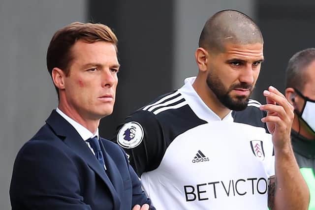 Fulham manager Scott Parker and Aleksandar Mitrovic. Clive Rose/PA Wire.