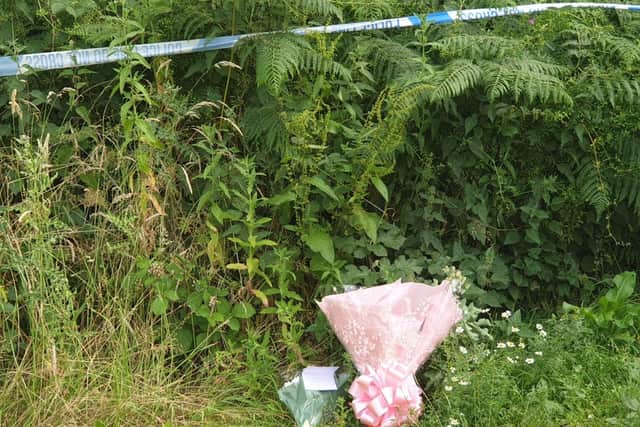 Some of the floral tributes to Abi that have been left at the scene