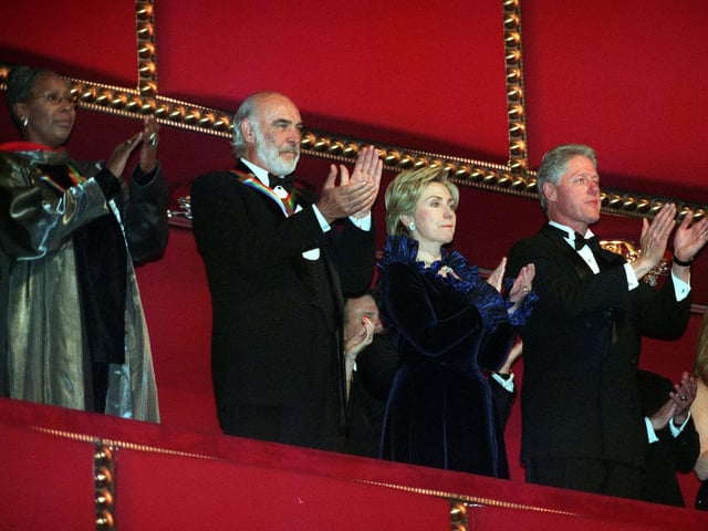 WASHINGTON  Kennedy Center Honorees, US dancer Judith Jamison and Scottish actor Sean Connery, applaud with First Lady Hillary Clinton and US President Bill Clinton after the singing of the National Anthem at the Kennedy Center 05 December 1999 in Washington, DC.  Jamison, Connery and three other performers were honored during the ceremony. 