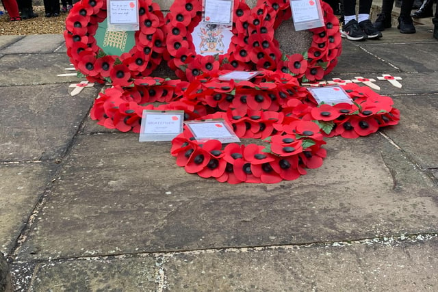 Wreaths laid at the memorial during Palterton Primary School’s service