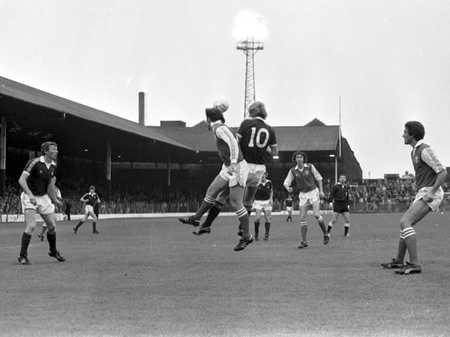 Action from the Hearts v Hibs Edinburgh Derby football match at Tynecastle in August 1980.