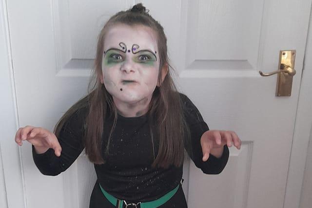 Six-year-old Brooke shows off her face paint.